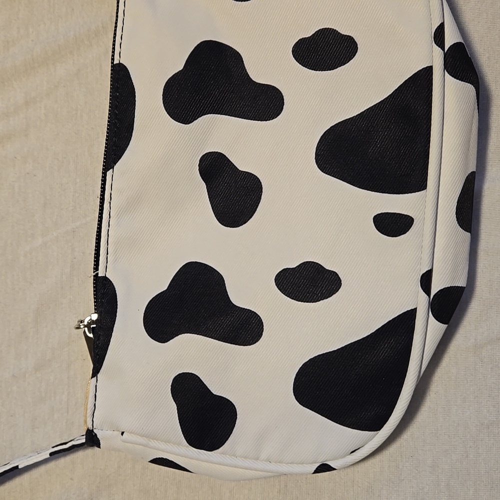 Cow shoulder purse